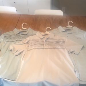 Lot of 3 Travis mathew golf shirts 2 are powder blue and 1 is light grey